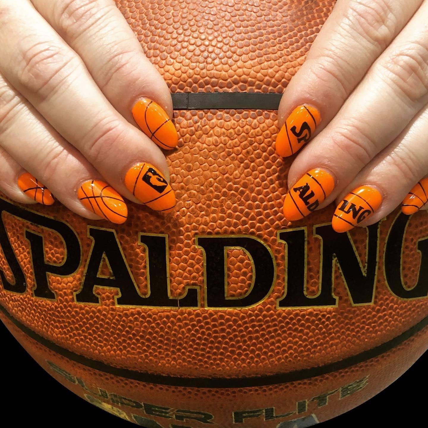 7. Orange Game-Day Spalding Nails - basketball nail ideas