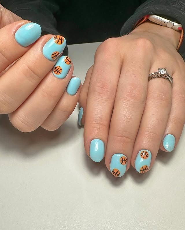 11. Sky Blue Mini Basketball Nails - basketball nail ideas