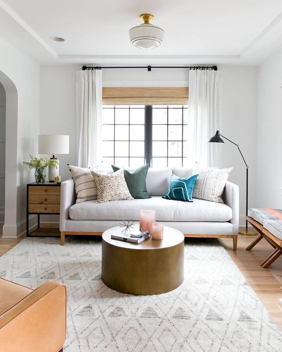 5. Bright Modern Comfort with Pops of Color - classy living room ideas