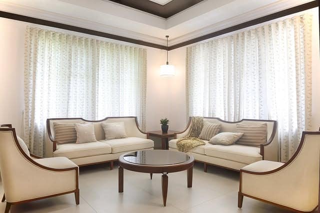 6. Symmetrical Cream Seating Suite - classy living room ideas