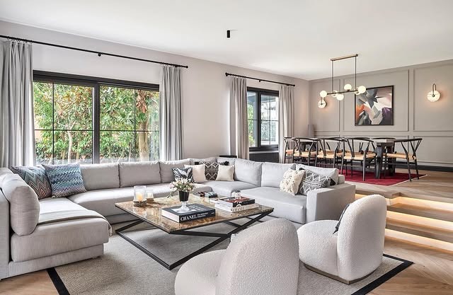 19. Warm Gray Comfort with Modern Geometry - classy living room ideas