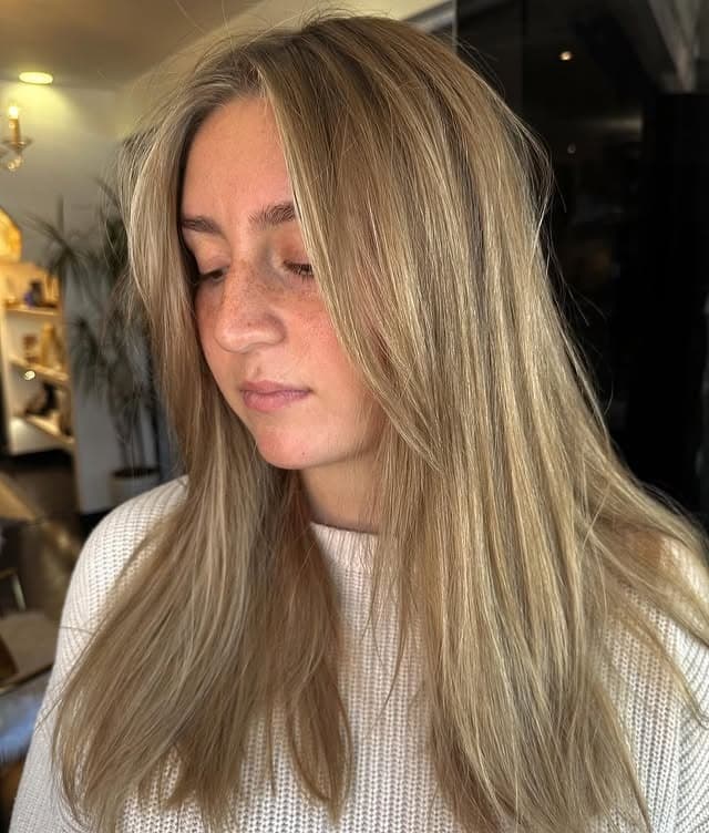 3. Soft Dirty Blonde Layered Cut with Natural Lift - Dirty Blonde Hair Color