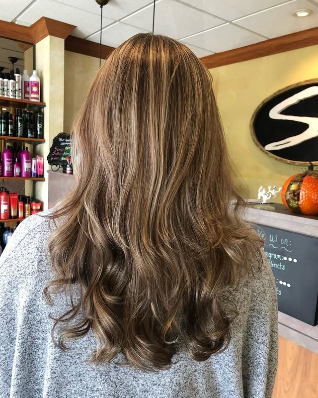 7. Classic Dirty Blonde Curls with Soft Dimension - Dirty Blonde Hair Color