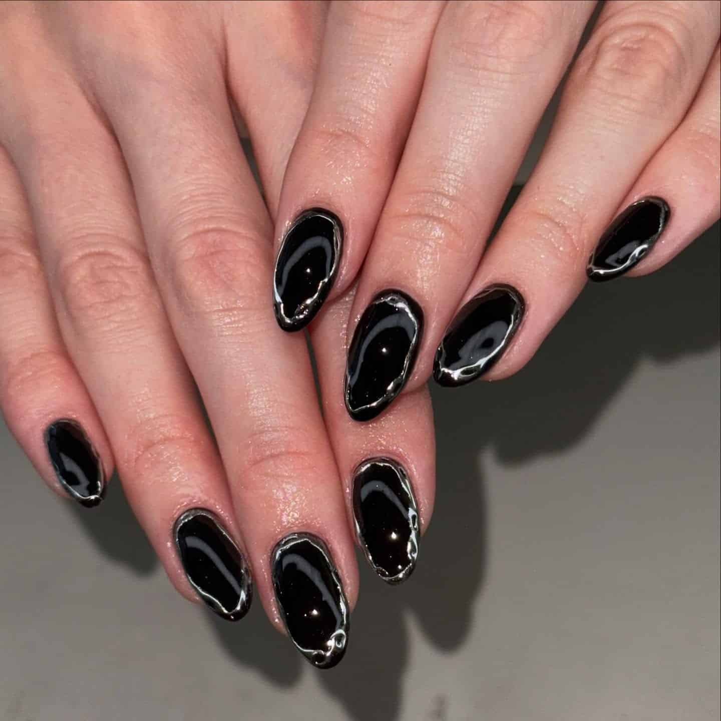 5. Liquid Chrome Outline Nails - black chrome nail ideas