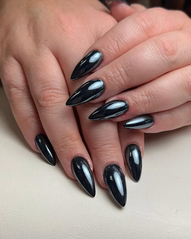 8. Mirror-Finish Black Chrome Stilettos - black chrome nail ideas