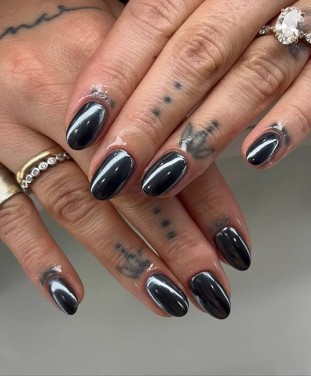 14. Ink Chrome Oval Nails - black chrome nail ideas