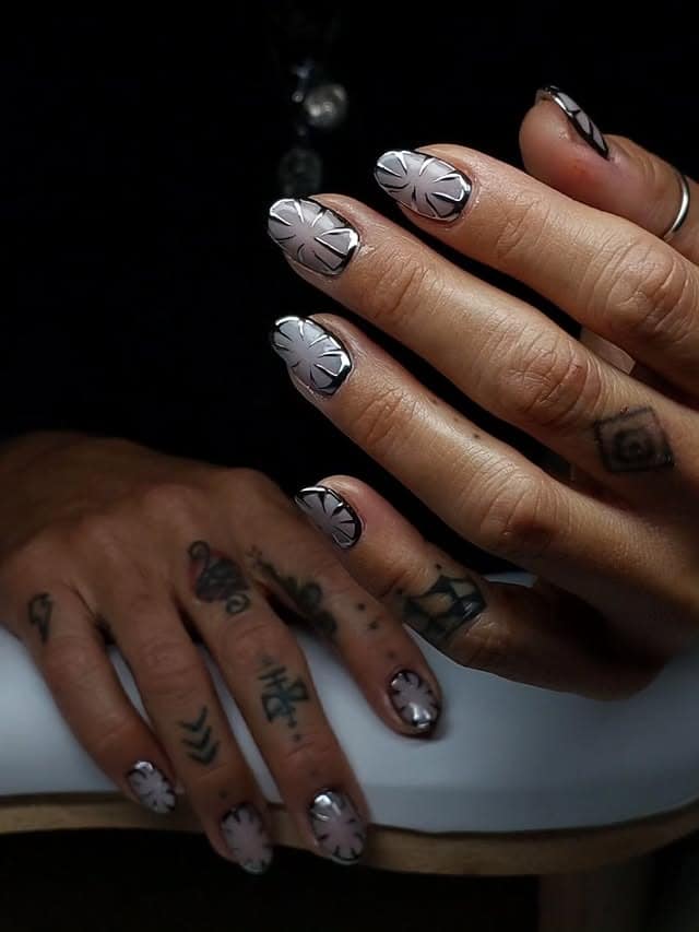 20. Black Chrome Flame Tips - black chrome nail ideas