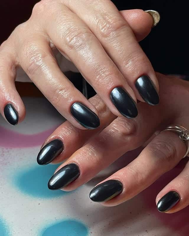 21. Metallic Charcoal Oval Nails - black chrome nail ideas