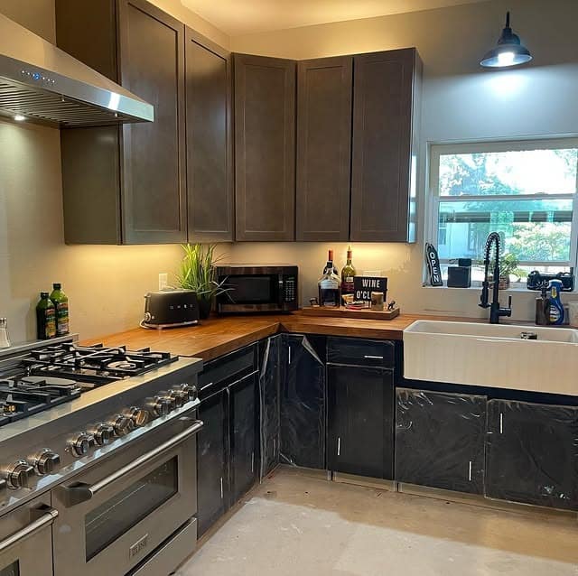 2. Warm Woods and Industrial Black Base Cabinets - barndo kitchen ideas