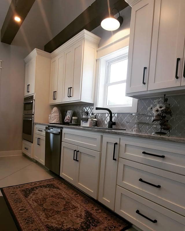 15. White Cabinetry With Patterned Tile Backsplash - barndo kitchen ideas