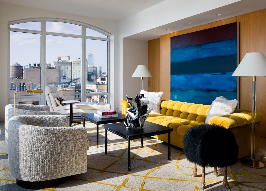 4. City-View Living with Gallery-Style Color - yellow and blue living room ideas