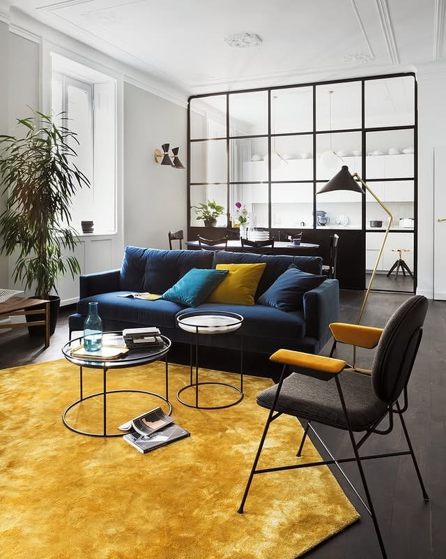 16. Urban Loft Style with Midnight Blue and Golden Textures - yellow and blue living room ideas