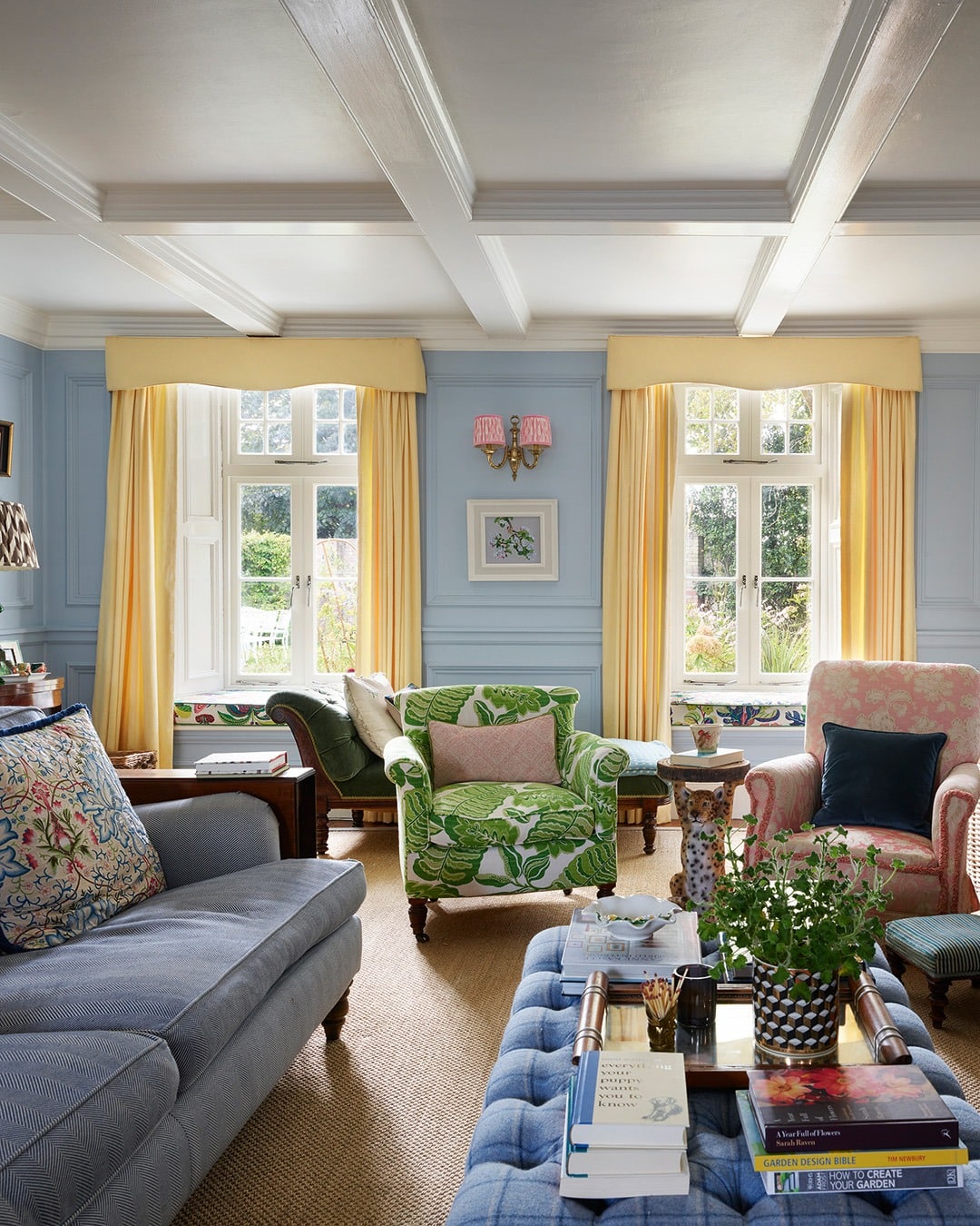 18. Pastel Blue Walls with Sunny Yellow Drapery - yellow and blue living room ideas