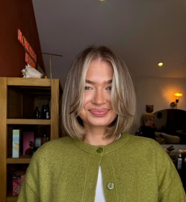 12. Dimensional Blonde Curtain Bob - Short Hairstyles