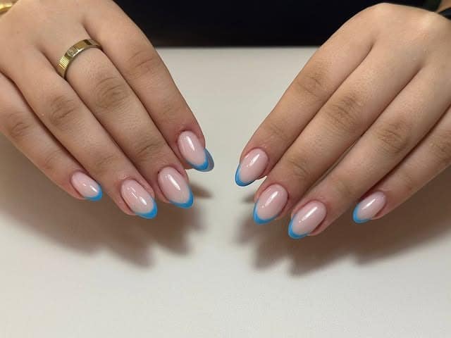 1. Soft Sky-Tipped Almond French - blue french nail ideas