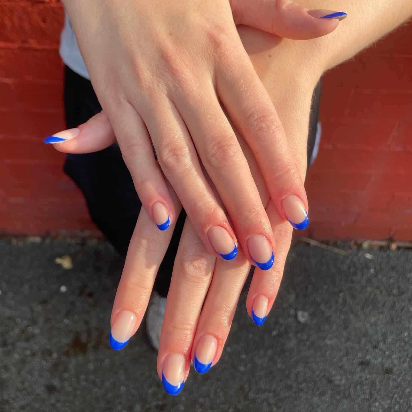 6. Classic Cobalt French Glow - blue french nail ideas