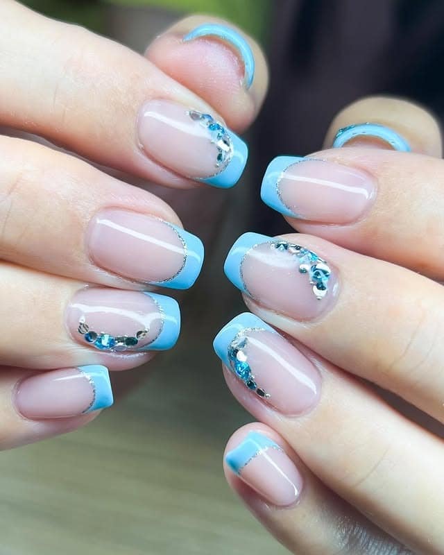 9. Crystal Blue Accent French - blue french nail ideas