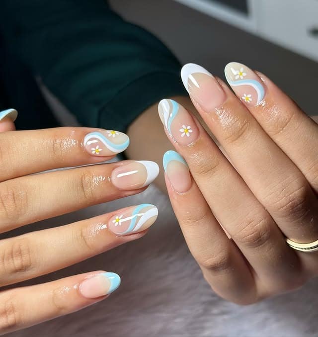 10. Pastel Blue Swirl French Floral - blue french nail ideas