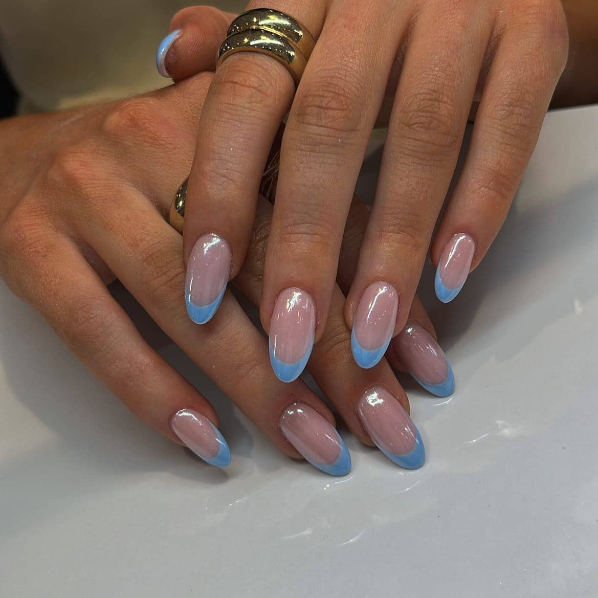 20. Soft Baby-Blue Almond French - blue french nail ideas