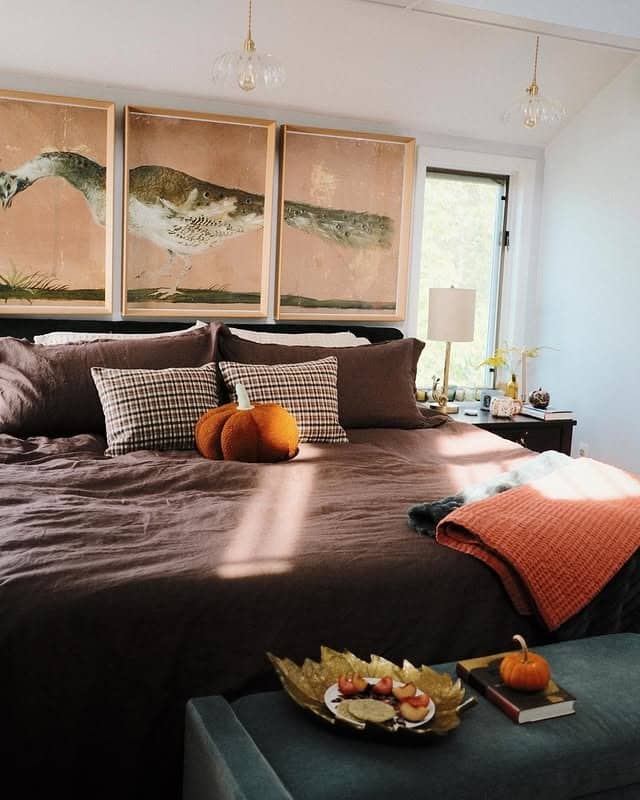 15. Deep Plum Bedding with Burnt Orange Highlights - fall bedroom ideas