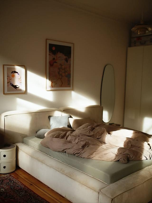 7. Golden Afternoon Bedroom With Soft Neutrals - mid century bedroom ideas