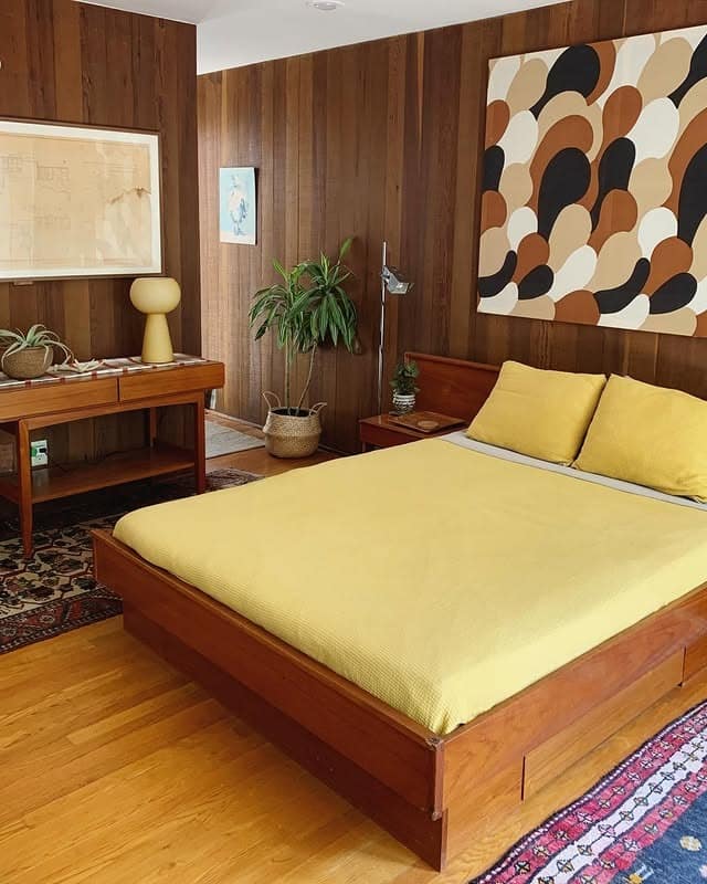 17. Golden Yellow Against Classic Wood Grain - mid century bedroom ideas