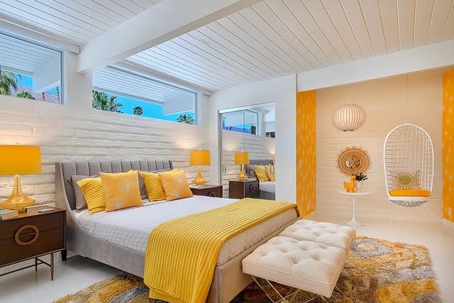19. Vibrant Citrus Tones in a Retro Palm Springs Palette - mid century bedroom ideas