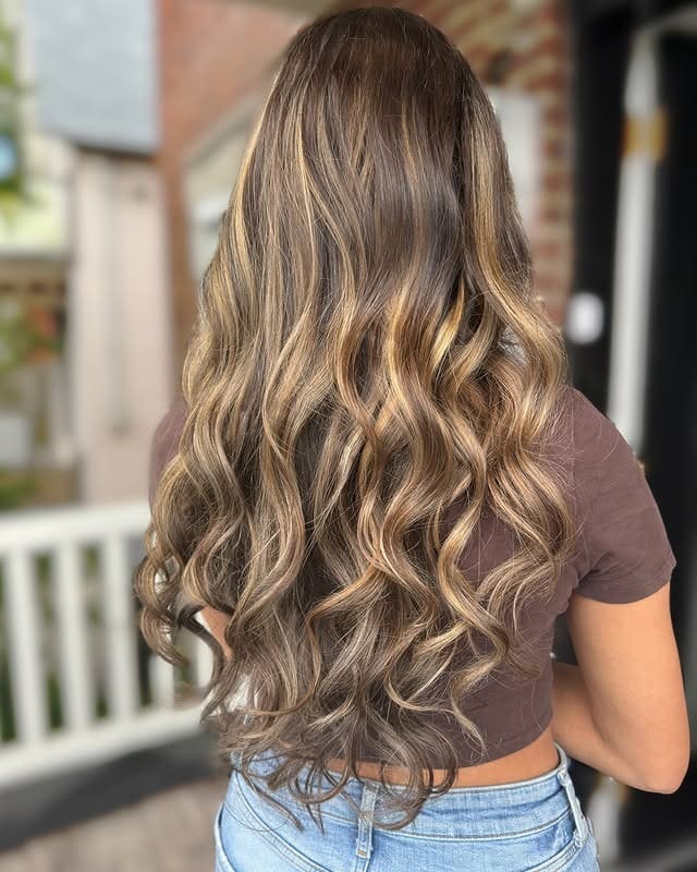 7. Rich Brunette with Smoky Caramel Accents - Caramel Balayage with Highlights