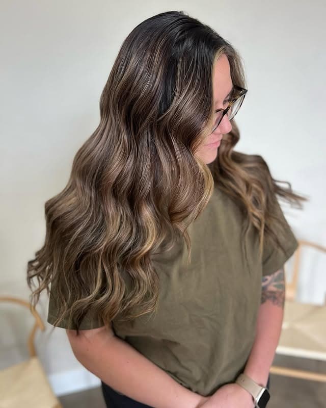 14. Earthy Caramel Balayage on Long Wavy Hair - Caramel Balayage with Highlights