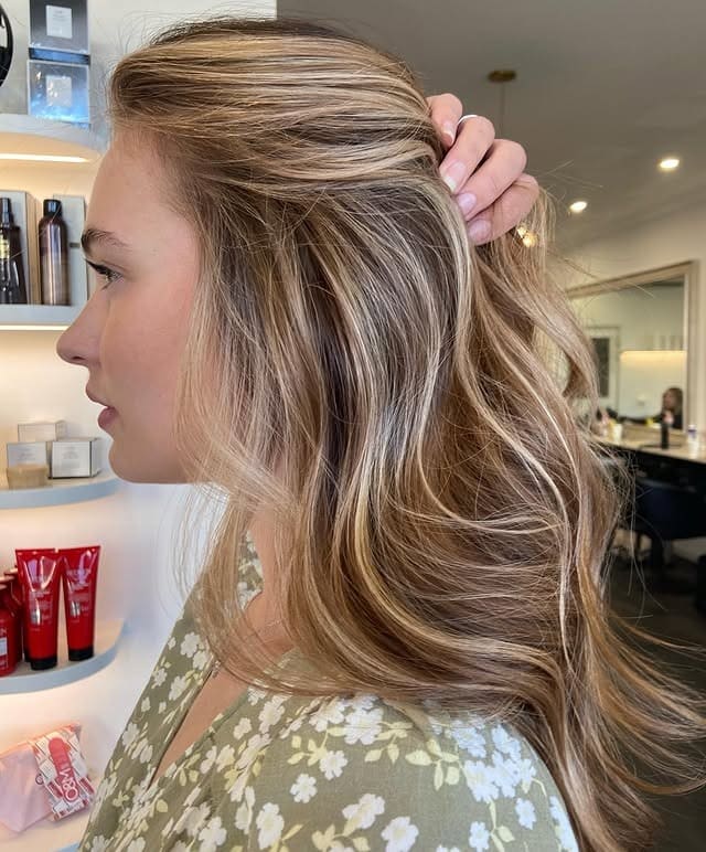 16. Golden Caramel Highlights on Polished Soft Waves - Caramel Balayage with Highlights