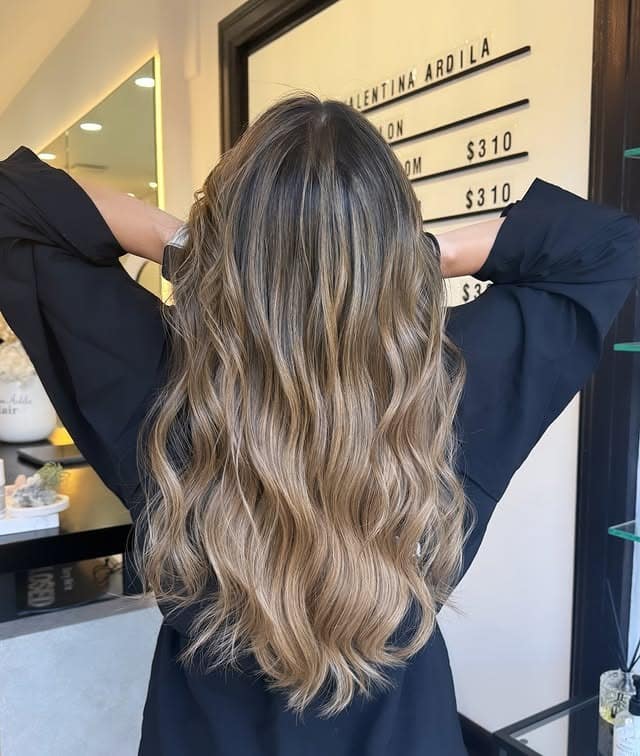 20. Sunlit Caramel Gradient on Long Loose Waves - Caramel Balayage with Highlights
