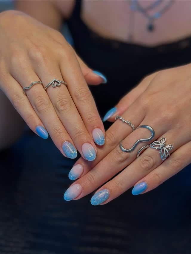 2. Soft Blue Gradient Shine Nails - blue summer nail ideas