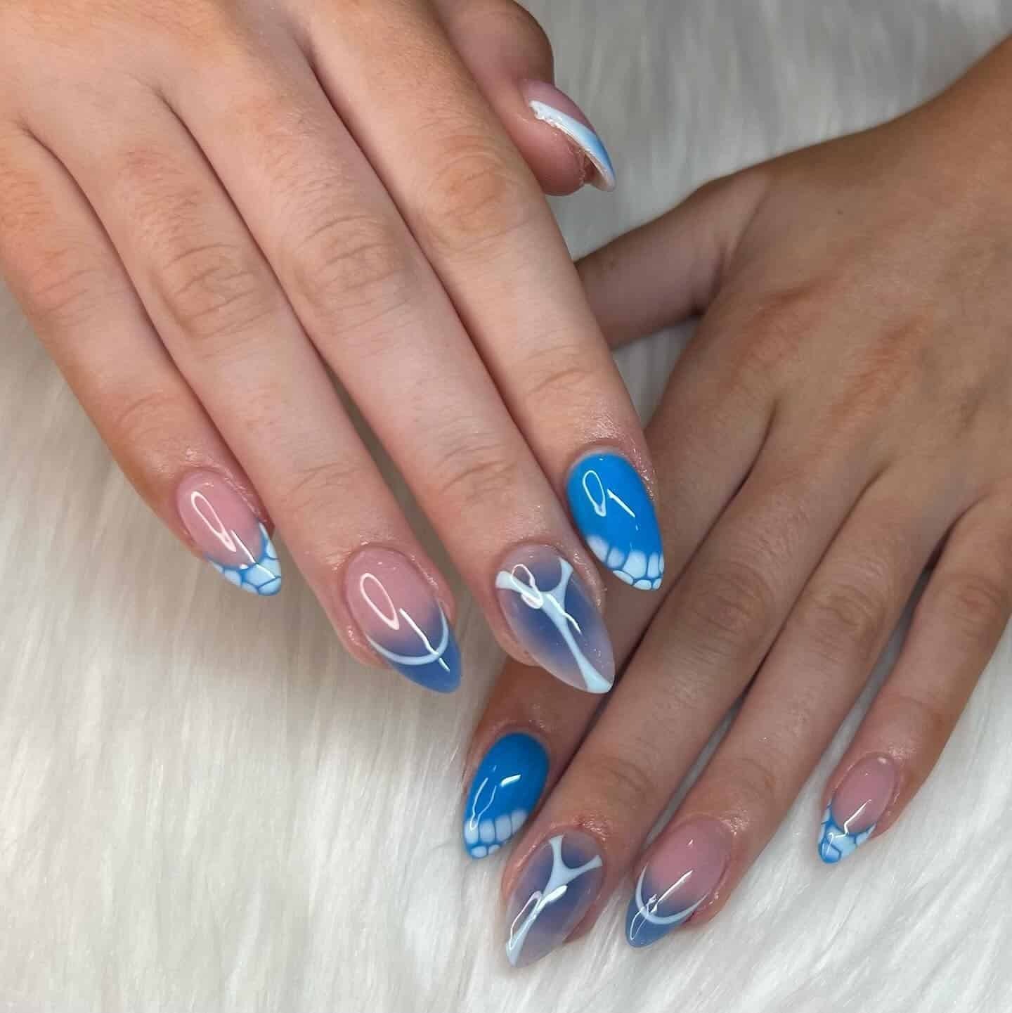 3. Blue Wave Line Art Nails - blue summer nail ideas