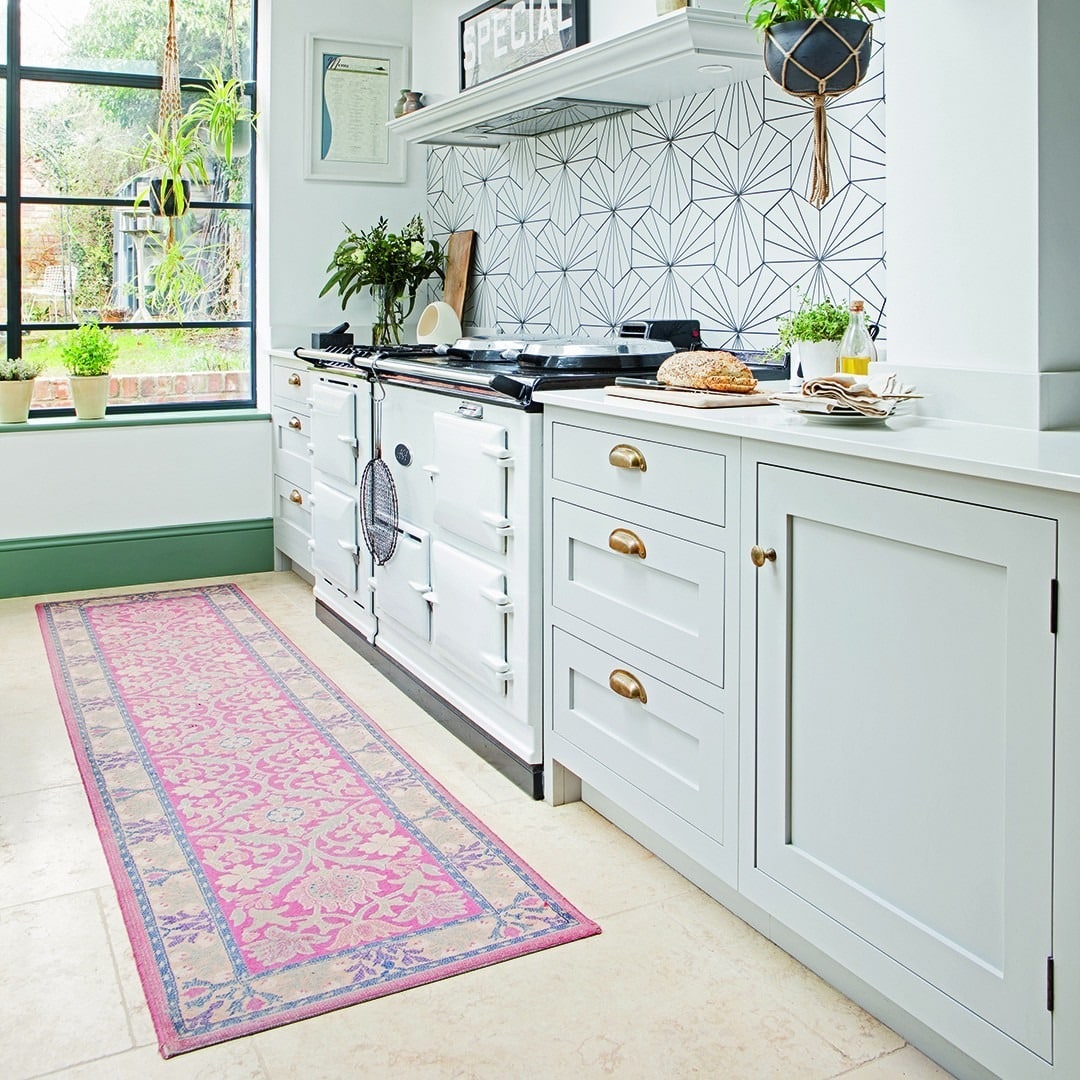 2. Modern White Kitchen with Pink Patterned Runner - kitchen rug ideas