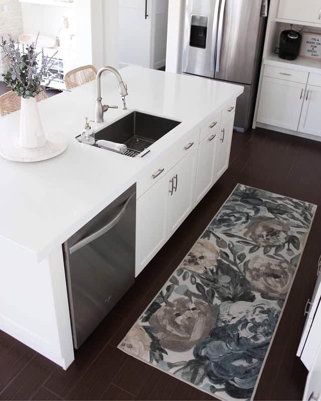 15. Bright White Kitchen with Oversized Floral Runner - kitchen rug ideas