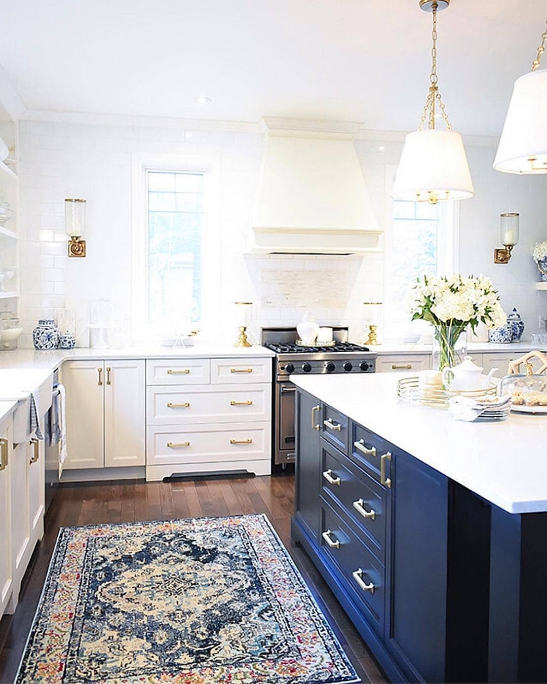 22. Navy Island Kitchen with a Bold Blue Vintage Rug - kitchen rug ideas
