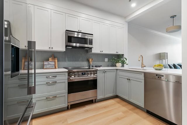 14. White & Dusty Blue Kitchen with Subtle Coastal Calm - two tone kitchen ideas