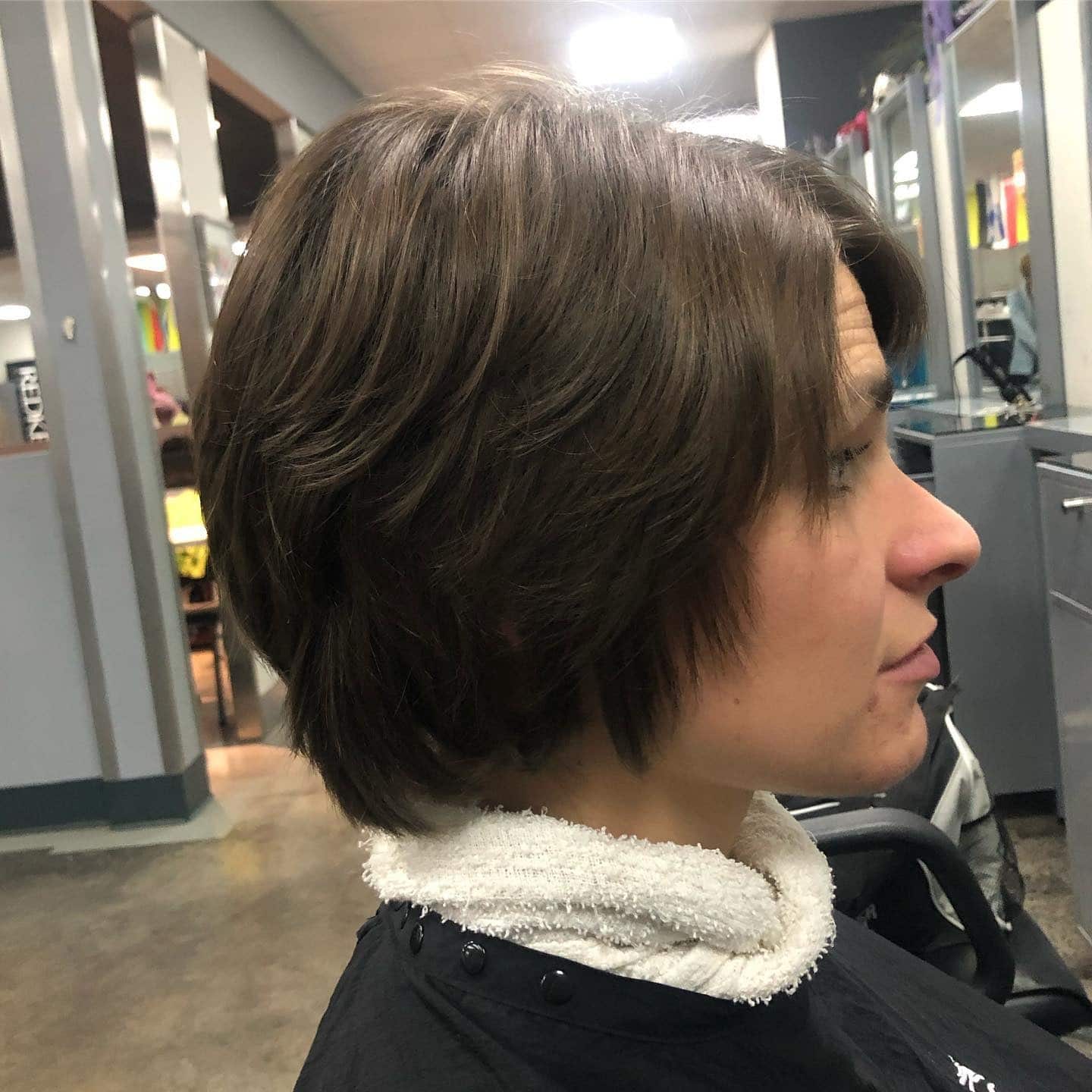 7. Soft Brunette Feathered Pixie Bob - Long Pixie Cuts