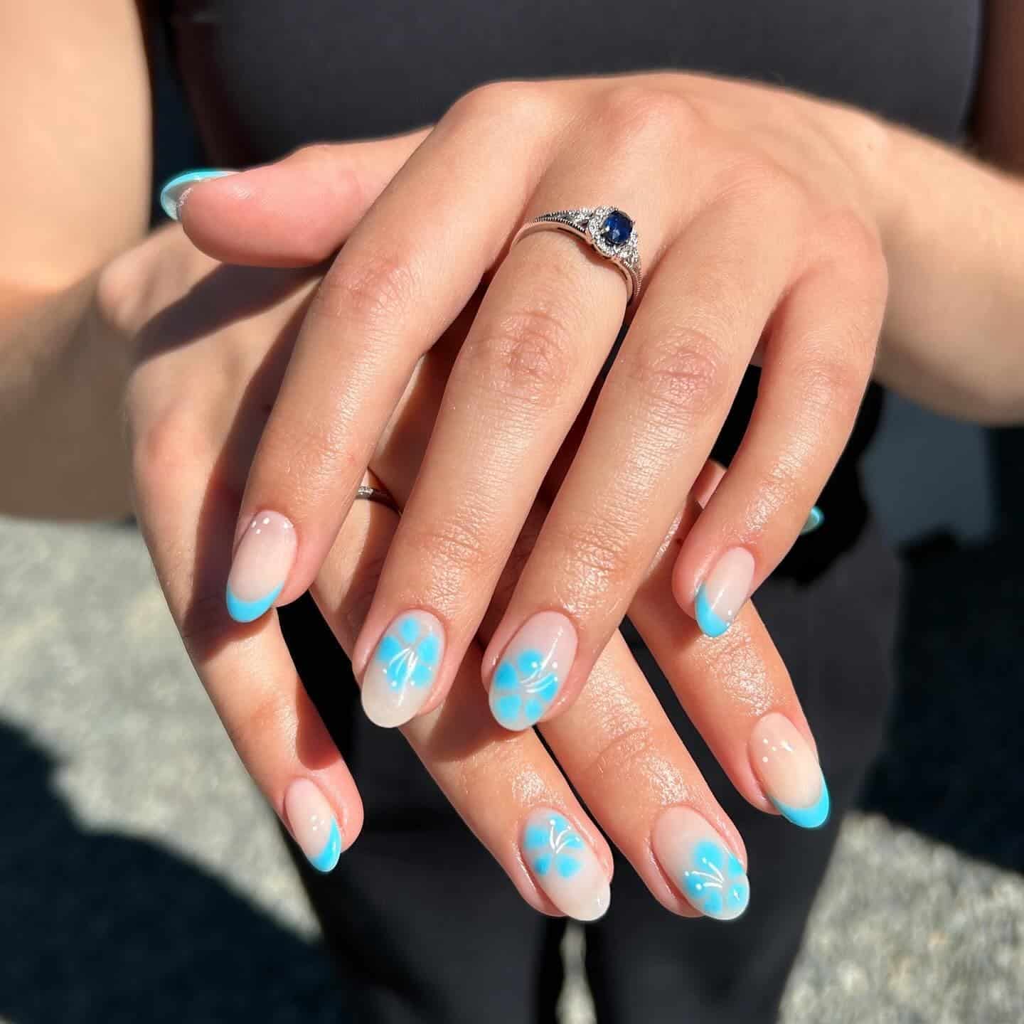 6. Cool Breeze Blue French and Florals - caribbean nail ideas