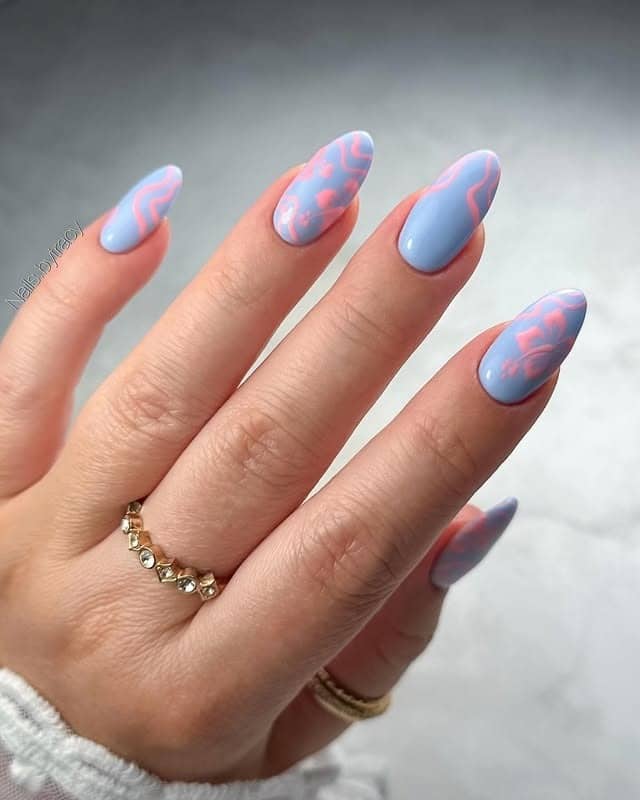11. Sky Coral Wave Almonds - caribbean nail ideas