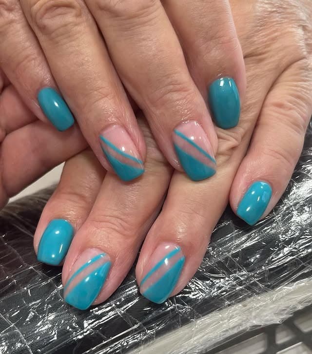 12. Aqua Stripe Short Rounds - caribbean nail ideas