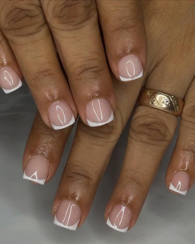 14. Classic Island White Tips - caribbean nail ideas