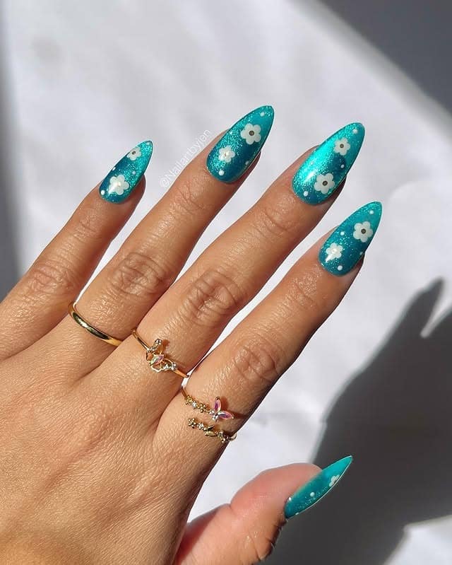 17. Sparkling Island Bloom Almonds - caribbean nail ideas