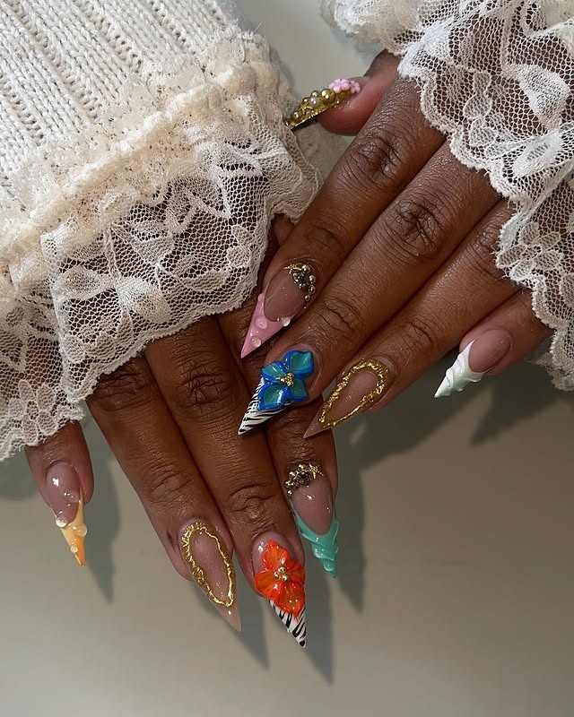21. Island Carnival Sculpted Stilettos - caribbean nail ideas