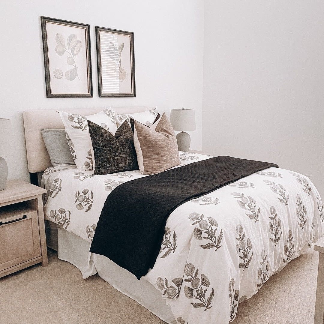 2. Botanical Soft-Black Elegance - black and cream bedroom ideas