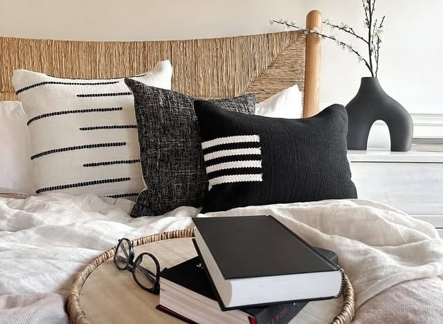 20. Textured Neutrals with Graphic Black Accents - black and cream bedroom ideas
