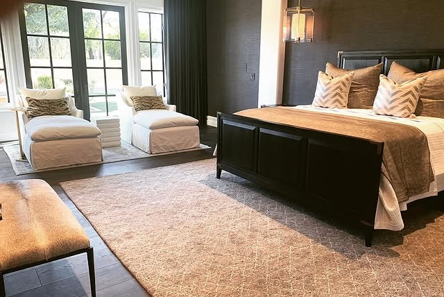 21. Warm Contemporary Black Bed with Cream and Taupe Layers - black and cream bedroom ideas