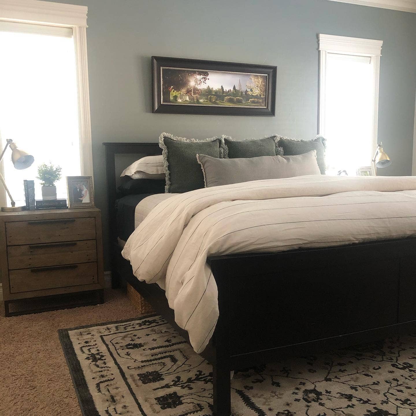 22. Soft Cottage Black Bed with Cream Comfort Layers - black and cream bedroom ideas