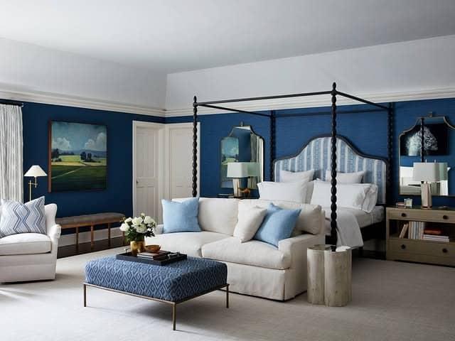6. Four-Poster Suite With Deep Blue Walls - blue and white bedroom ideas