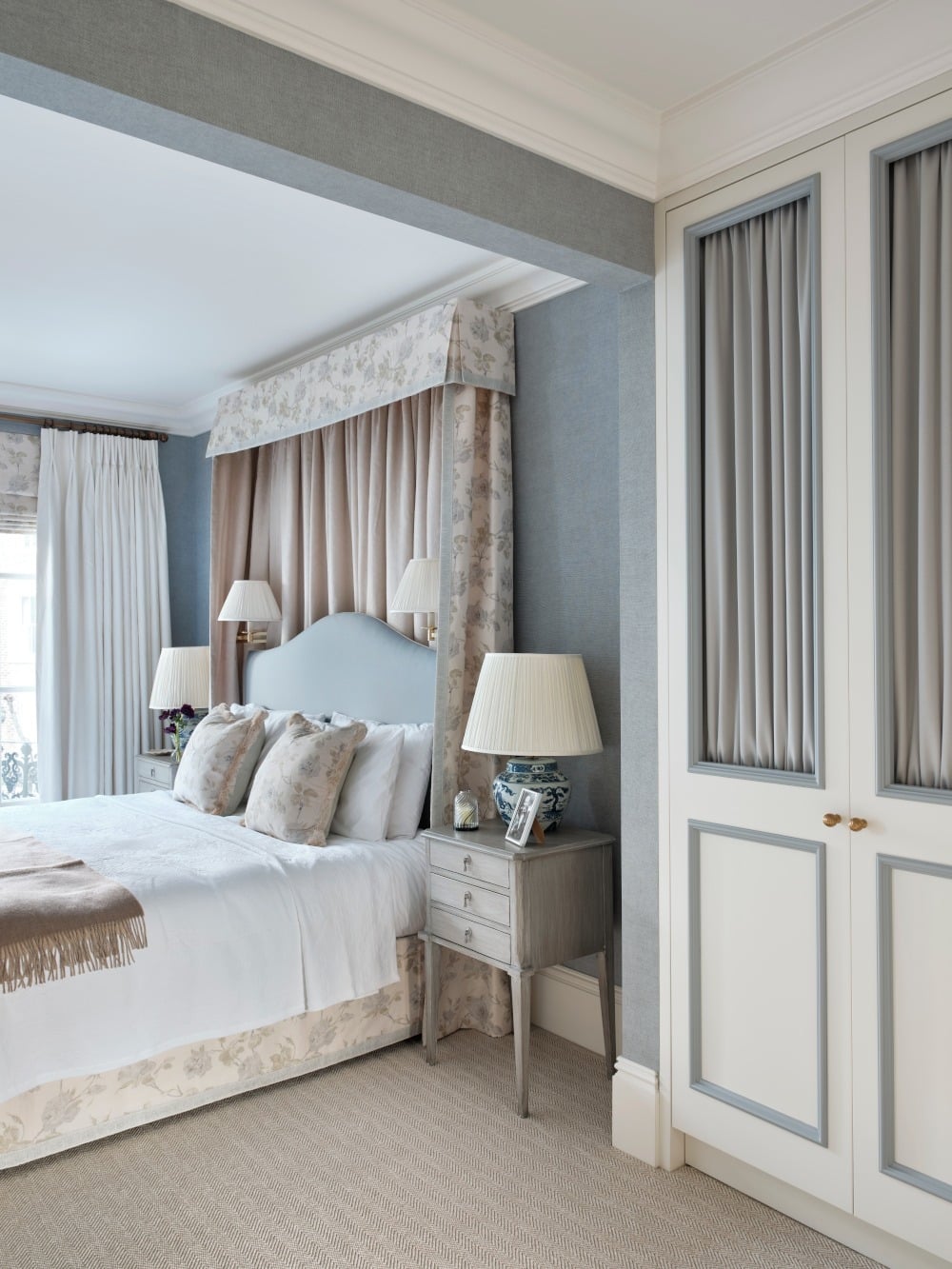 15. Pale Blue Draped Canopy Bedroom - blue and white bedroom ideas